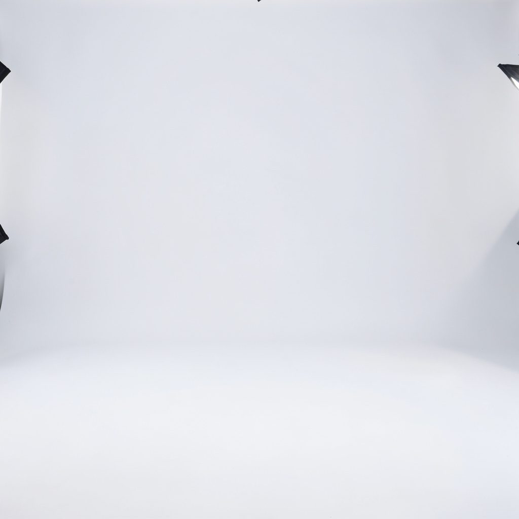 Soft abstract layered background in muted gray and charcoal tones with subtle geometric shapes